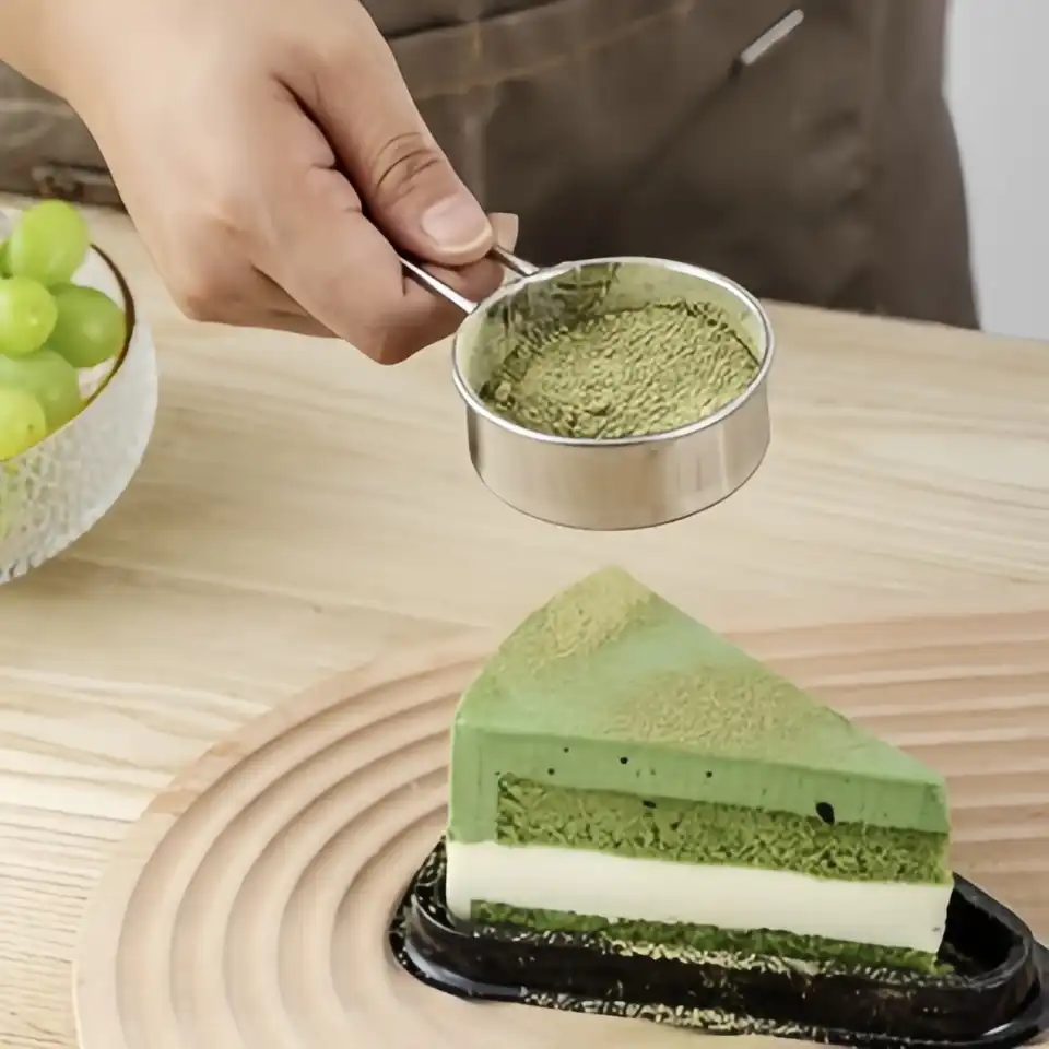 The fine-mesh sieve is used to sift the matcha The fine-mesh sieve is used to sift the matcha