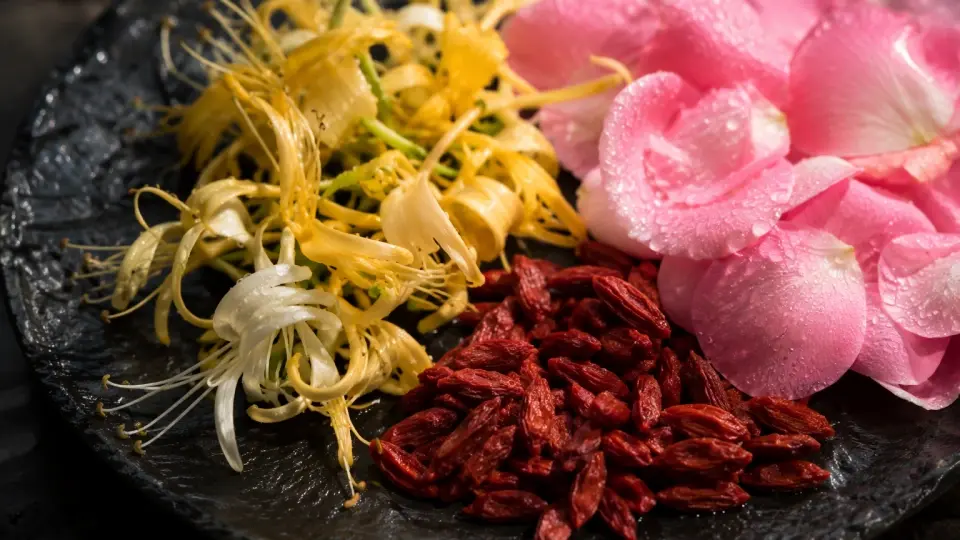 A Beautiful Selection of Honeysuckle Flowers, Goji Berries, and Rose Petals